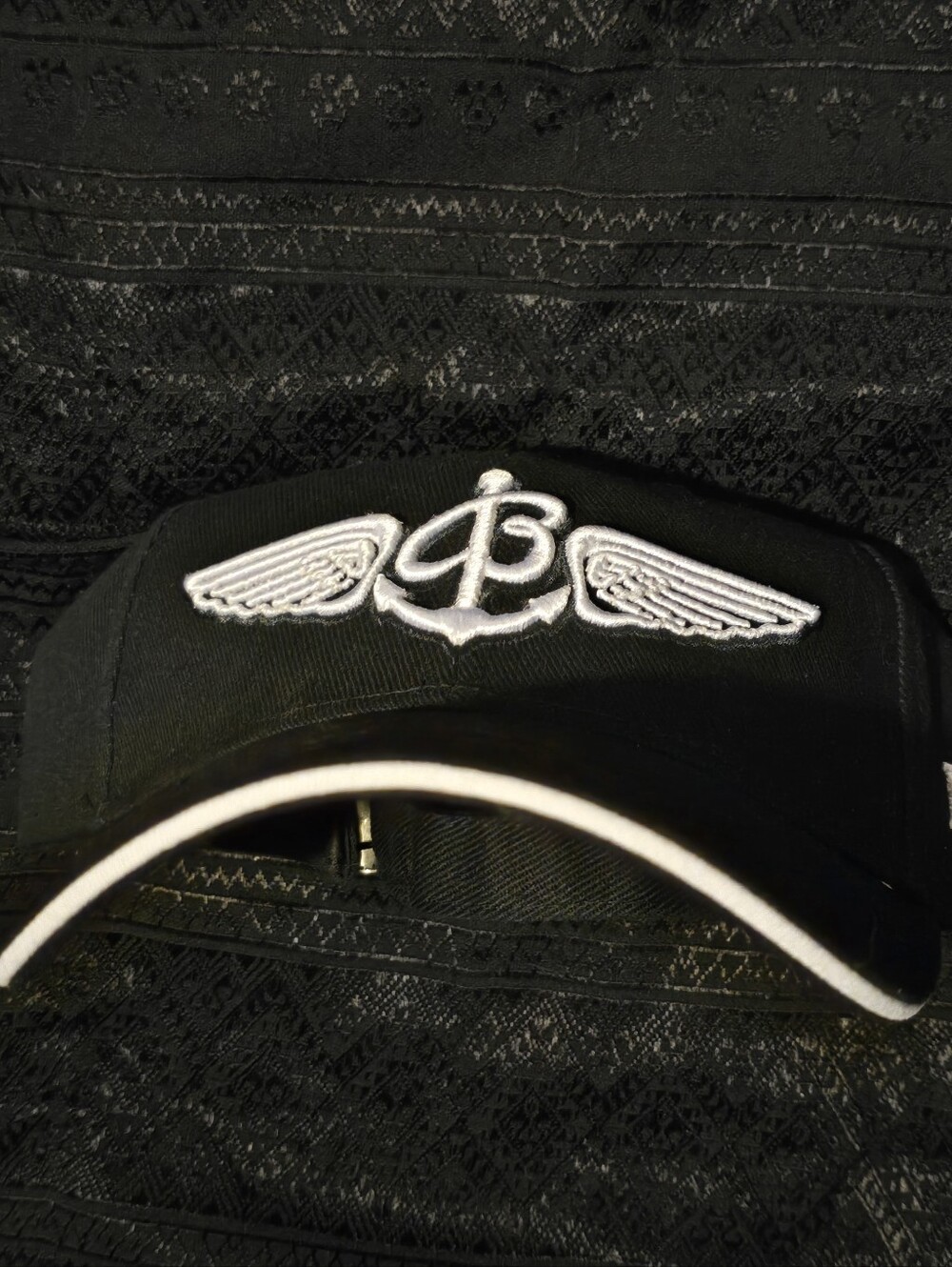 Black BREITLING Men's Baseball Cap with White Wing Emblem